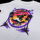 Youth girls white graphic T-shirt showing a large colorful motorcycle-style logo