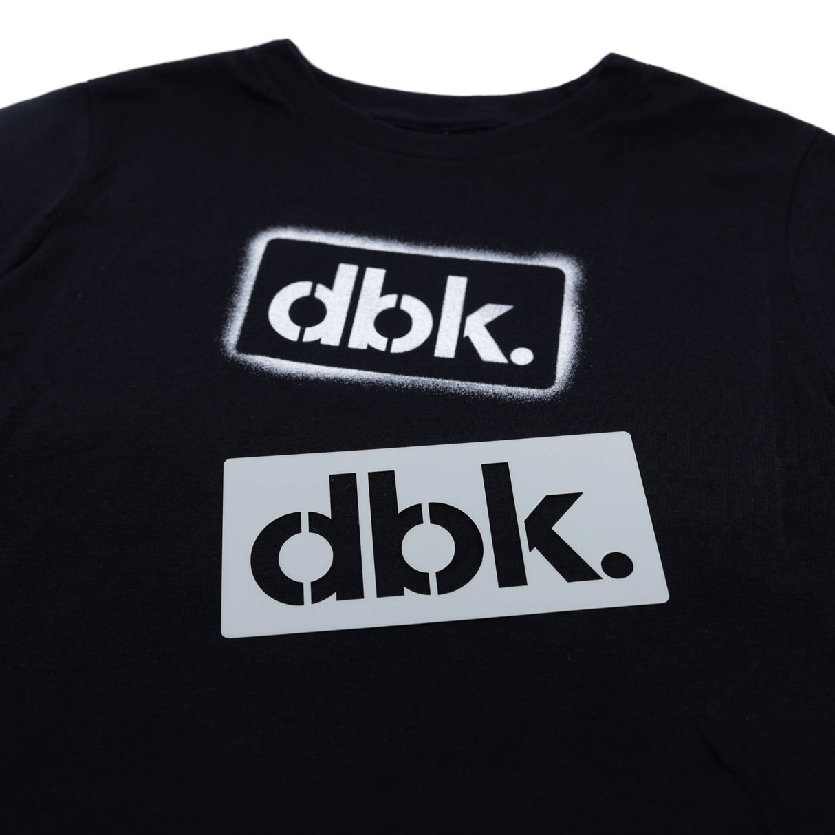 Youth black T-shirt with two dbk. stencil graphic decals on front