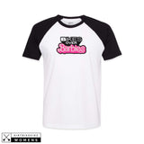White and black raglan T-shirt with Bikes Over Barbies logo graphic on chest