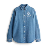 Oversized blue denim shirt with button front and dbk flame logo at chest.