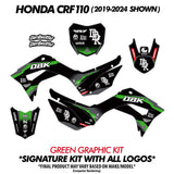 Pit bike graphics kit with black base and green accents on side panels