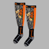 Pair of moto socks with black cuffs, camo legs, orange accents, and white stripe details.