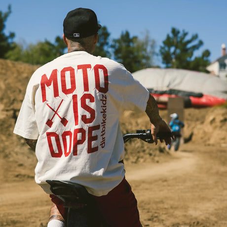 Cream tee with large red 'MOTO IS DOPE' back print and short sleeves