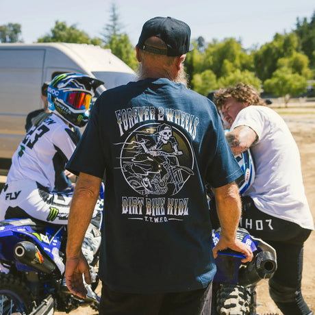Navy Ghost Rider Tee back view with circular skull rider graphic and text