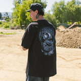Black crew-neck T-shirt with large back print of winged motorcycle emblem.