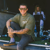 Military green crewneck T-shirt with small chest “Dirt Bike Kidz” logo print