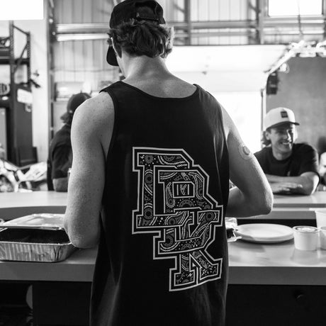 Black sleeveless tank top back print with large patterned 'R' graphic design