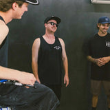Black kids tank top with small 'DIRT BIKE KIDZ' logo on front