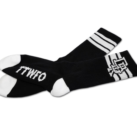Black crew sock with white stripes, “TTWTF” lettering, and top graphic detail.