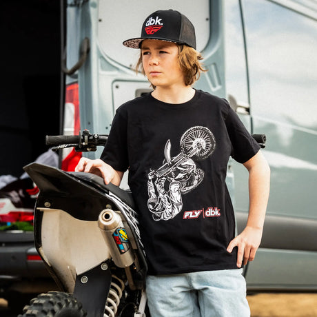 Dirt Bike Kidz black youth tee with wheelie rider graphic and FLY dbk logo