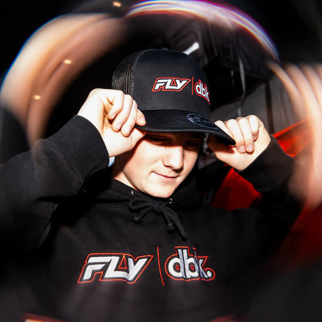 Black cap with small red/white FLY|dbk logo and mesh back
