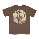 Brown womens graphic T-shirt with crew neck and small Desert Season logo on front