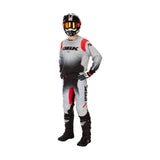 Kinetic DBK jersey with gray body, red accents, and black logo panel
