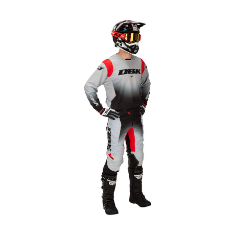 Motorcycle riding pant with white-gray base, black lower panels, and red side stripe