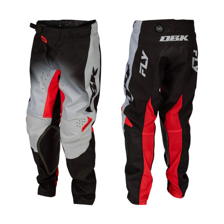 Youth motocross pants, black and light gray with red accents and bold logo graphics