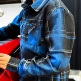 Youth flannel shirt with blue and black plaid, button front and chest pocket