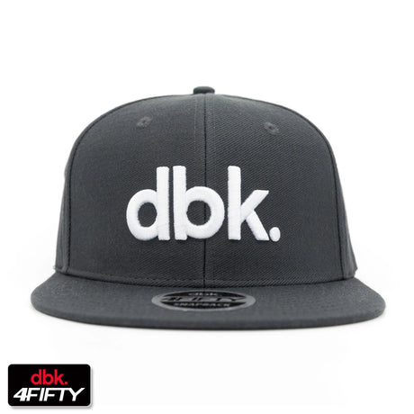 Charcoal snapback cap with large white "dbk" logo on the front