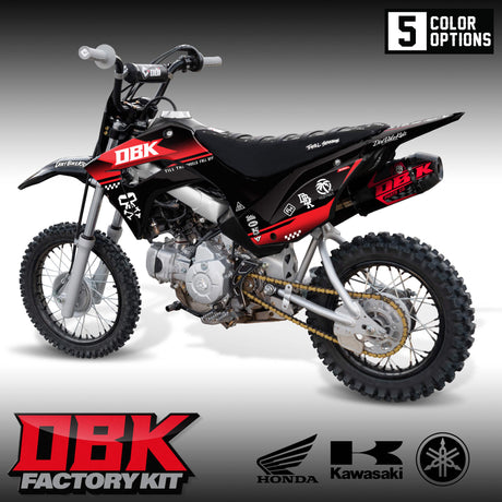 Pit bike factory graphic kit on black and red bike, DBK side decals and graphics