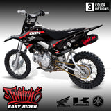 Black pit bike with red and white graphics and knobby off-road tires