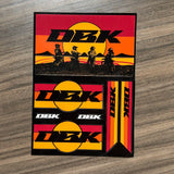 Sticker pack sheet with orange-red D2K scene, logos, and vertical stripe decals