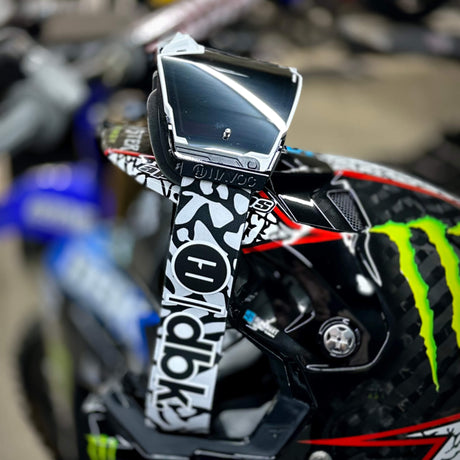 Helios goggle with mirrored lens on black-and-white patterned strap
