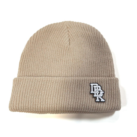 Tan ribbed knit beanie with stitched logo patch on side