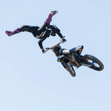 Black riding pants with white logo lettering and protective knee panels