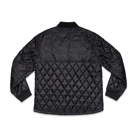 Premium jacket back view with quilted diamond pattern and repeating dbk logo finish