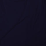 Navy tank top fabric close-up with smooth knit texture.
