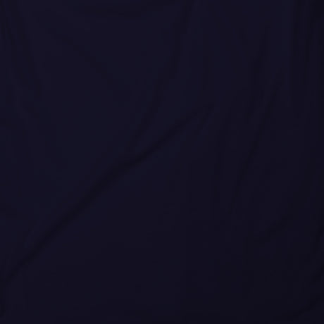 Navy tank top fabric close-up with smooth knit texture.