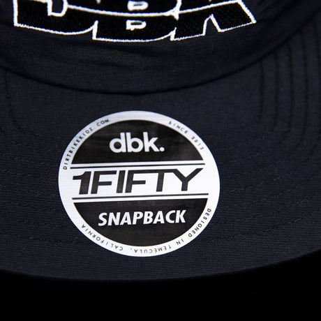 1FIFTY snapback logo patch on the brim of a black cap.