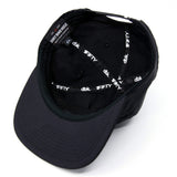 Black snapback cap interior showing printed logos and adjustable strap.