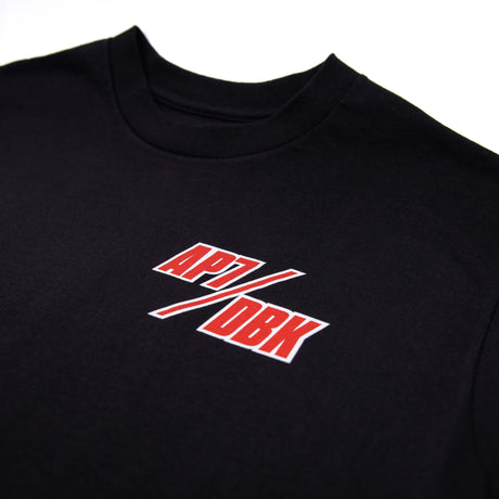 Black T-shirt with small red and white AP7 logo on chest