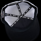 Black trucker hat interior lining with 2FIFTY and dbk printed bands.