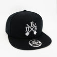 DBK Shovel 4Fifty Snapback in black with white cross logo on front