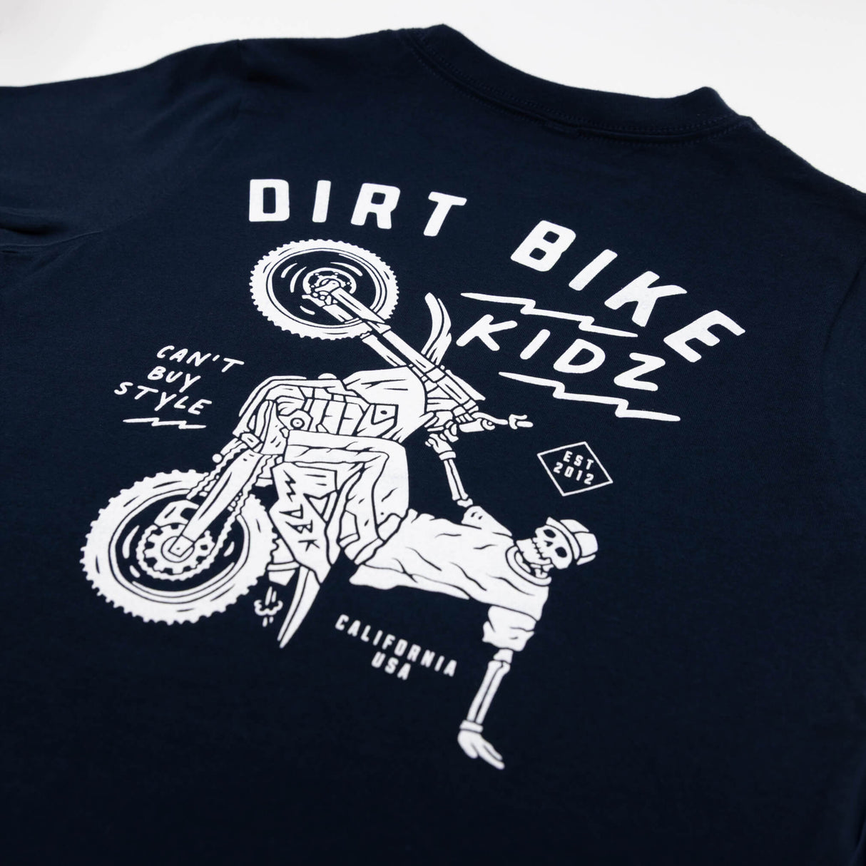 Navy youth premium tee close-up of back rider graphic with DIRT BIKE KIDZ