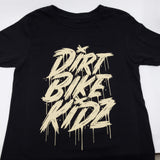 Black youth tee close-up with centered beige DRRT BIKE RIDE graphic print.