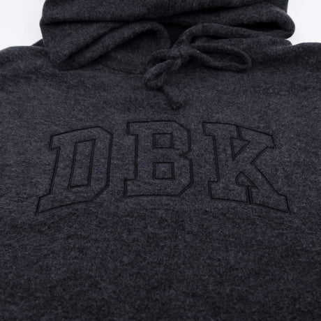 Women’s dark charcoal pullover hoodie close-up of front logo and drawstring hood