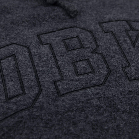 Women’s dark charcoal pullover hoodie extreme close-up of front logo graphic