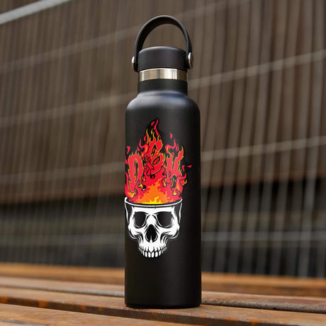 Flame skull sticker on matte black water bottle with metal carrying lid