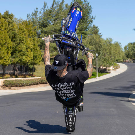 Black T-shirt with large white back graphic and blue logo