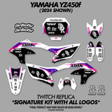 Dirt bike decal kit sheet with multiple purple, black, and white replacement panels