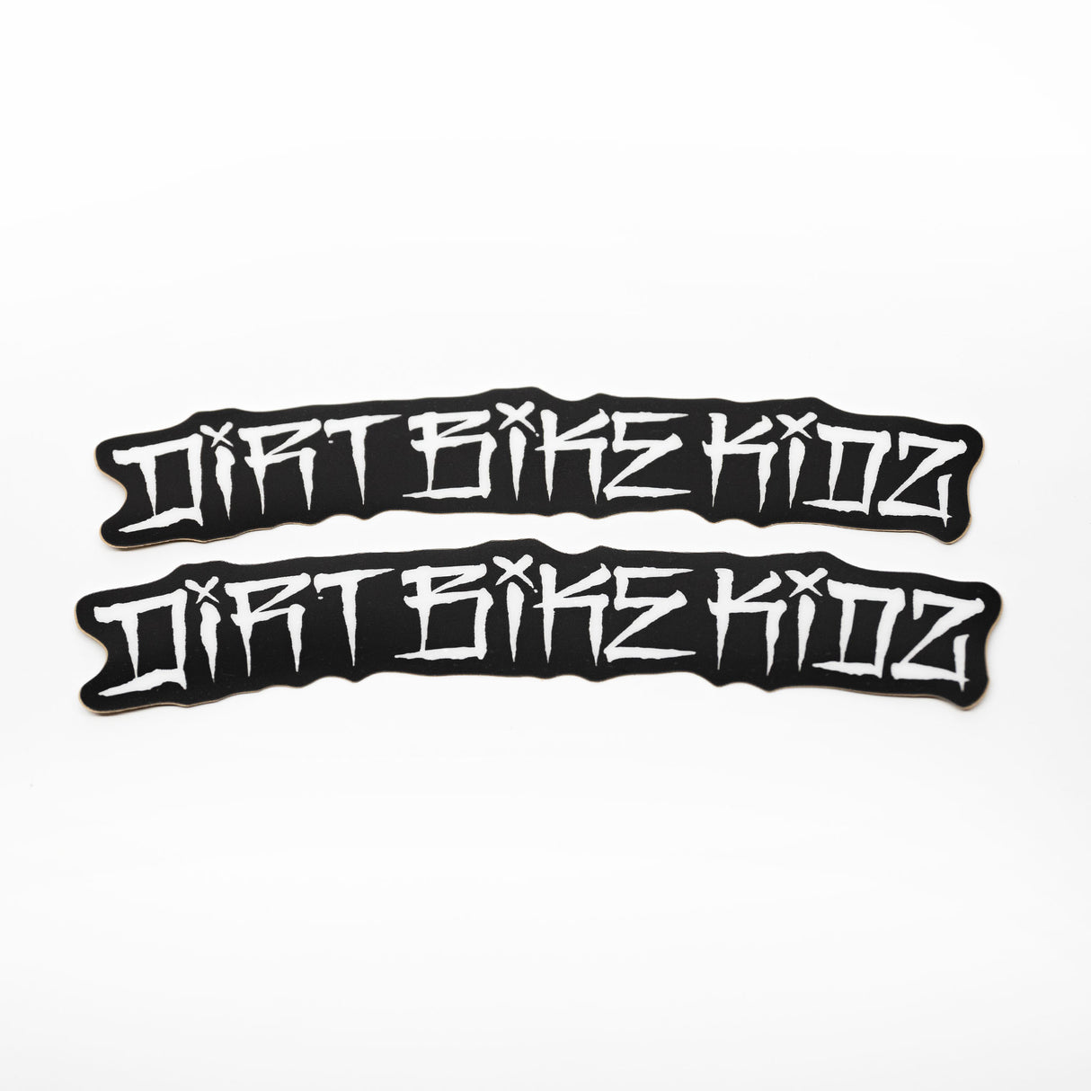Graffiti-style die-cut bike sticker set, two black pieces with white outlined lettering