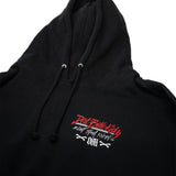 Black hoodie close-up of hood drawstrings and small chest graphic