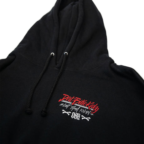 Black hoodie close-up of hood drawstrings and small chest graphic