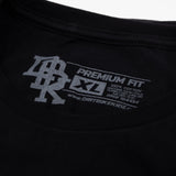Black crew-neck T-shirt label reads Premium Fit near collar