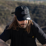 Black dad hat with dbk front logo and Adjustable side badge