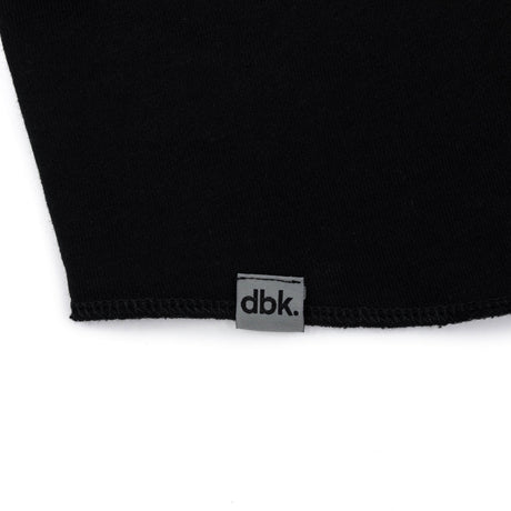 Black hoodie hem with dbk label tag centered at the bottom