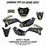 Motorcycle graphics decal set in black with yellow trim, multiple side panels