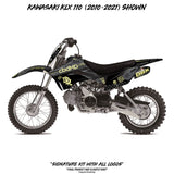 Kawasaki KLX 110 off-road bike with black and yellow faded side graphic panels